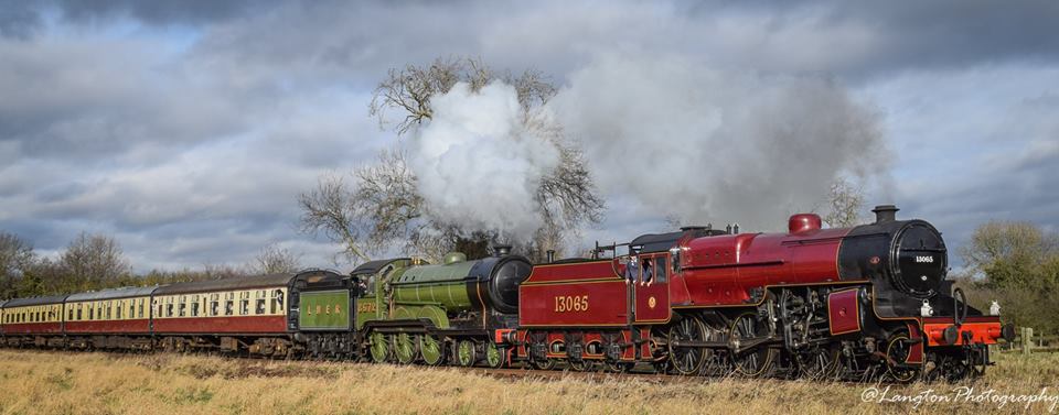 Crab 13065 leads B12 8572 on the express at the Great Central Railway