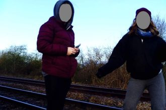 Network Rail issue safety warning as girls play on tracks in Howden