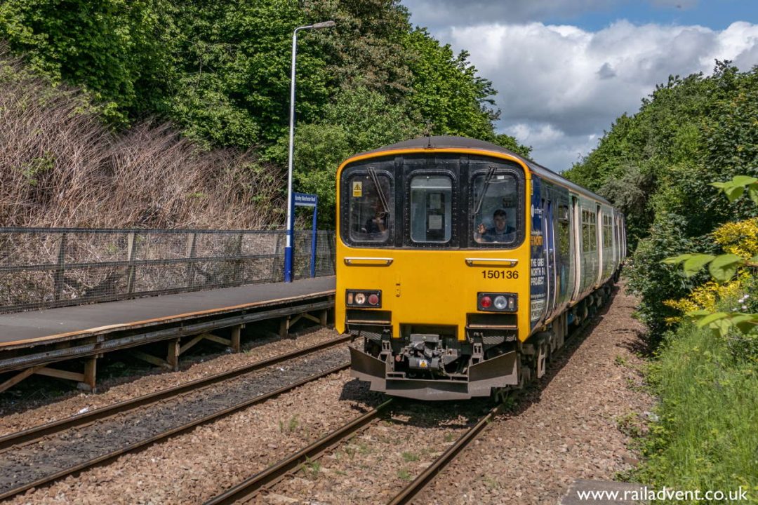 150136 speeds through Burnley Manchester Road