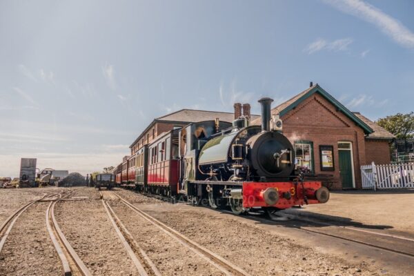 Sir Haydn stands at Tywyn Wharf on the Talyllyn Railway