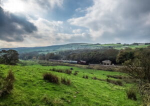 LMS 'Crab' No. 13065 arrives at Irwell Vale - East Lancashire Railway