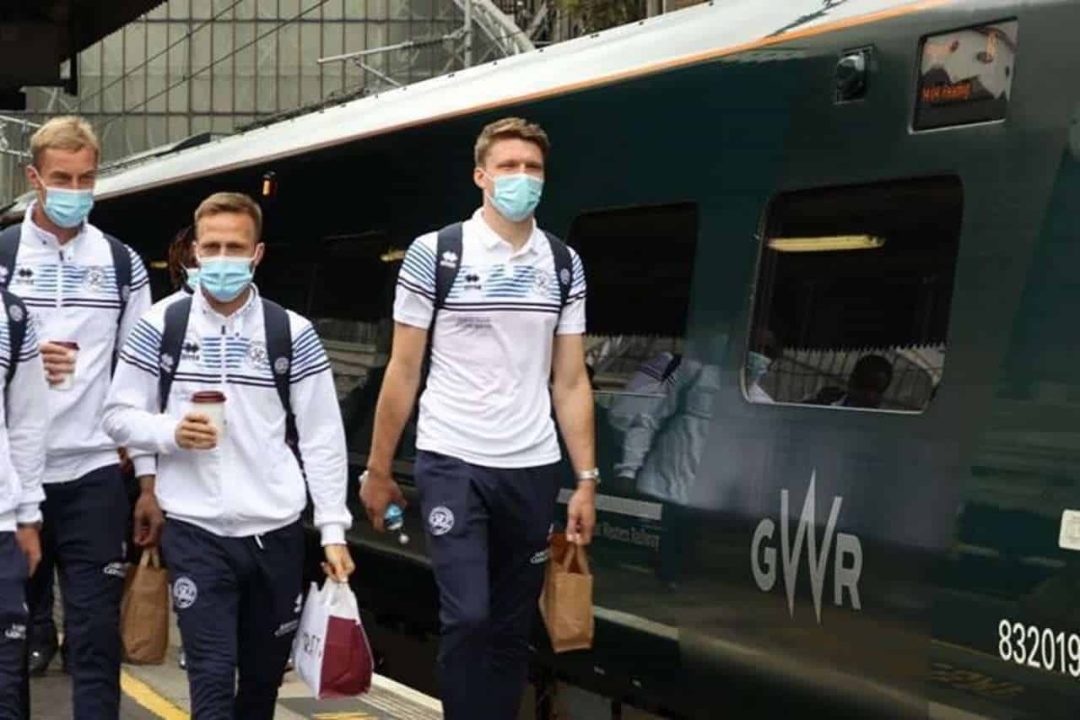 Boarding Queens Park Rangers players Joe Lumley, Todd Kane and Rob Dickie at London Paddington