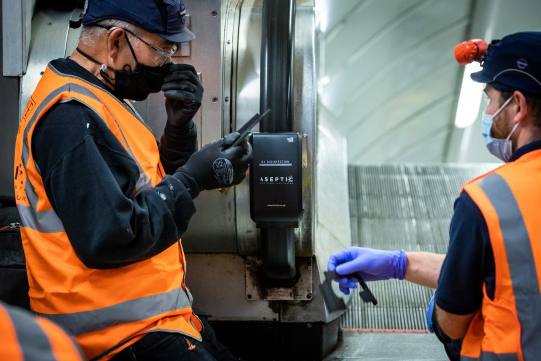 A UV steriliser system is intalled on an escalator hand rail at Kings Cross St Pancreas station. The self sufficient system eliminates 99.9% of bacteria on the surface of the handrail and is powered using a dynamo motor.