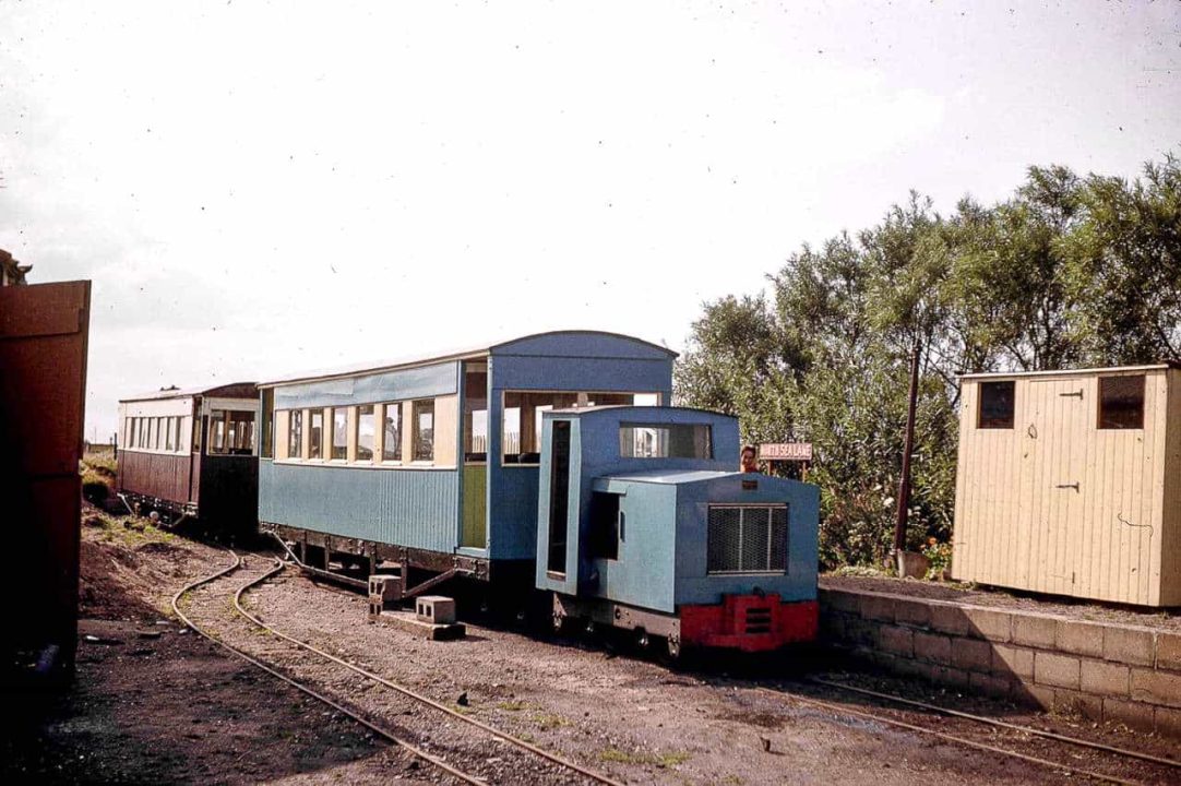 back to 1962 and it's the original North Sea Lane station, where recently acquired and re-bodied ‘Simplex' “Wilton” (builder's number 7481 of 1940) is ready to depart for Beach with one of the former Ashover Light Railway carriages restored by the LCLR after years as a sports pavilion at Clay Cross, Derbyshire