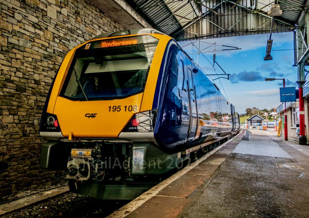 Northern 195108 awaits departure at Oxenholme Lake District