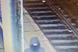 Images released after man threatened and shown axe at Dodworth station in South Yorkshire