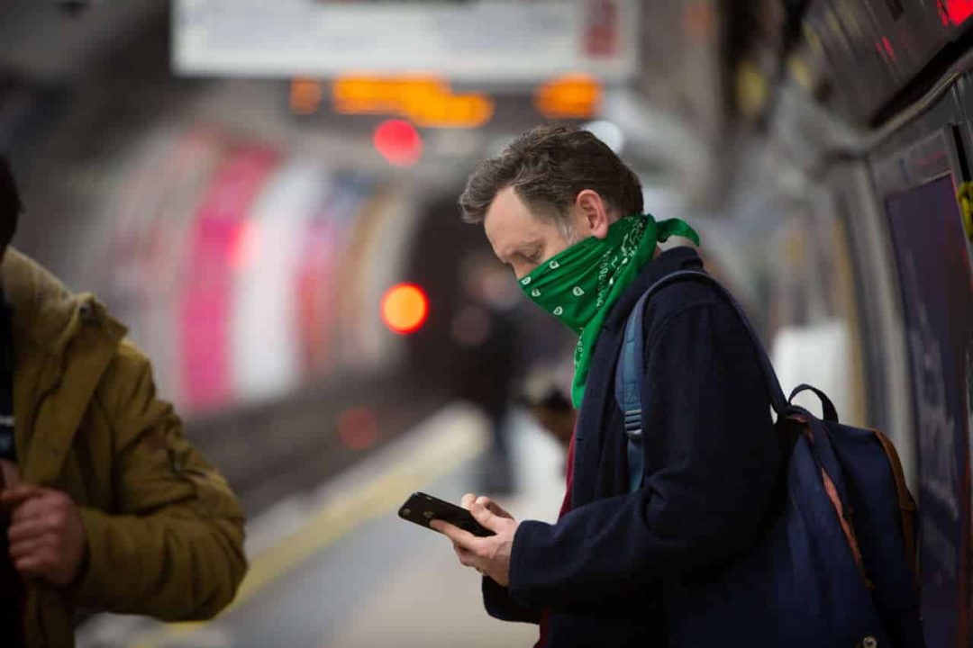 Customers wearing face masks on the London