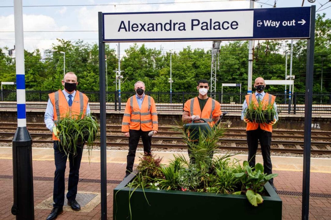 Rail Minister Chris Heaton-Harris joins Thameslink and Great Northern MD Tom Moran (far right), Groundwork London's Director of Youth Employment and Skills Graham Parry and Kickstart trainee Abdallah Ghanmi (with watering can)