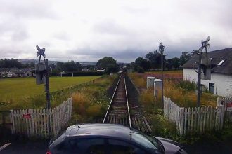 CCTV shows car inches away from train on Lake District level crossing