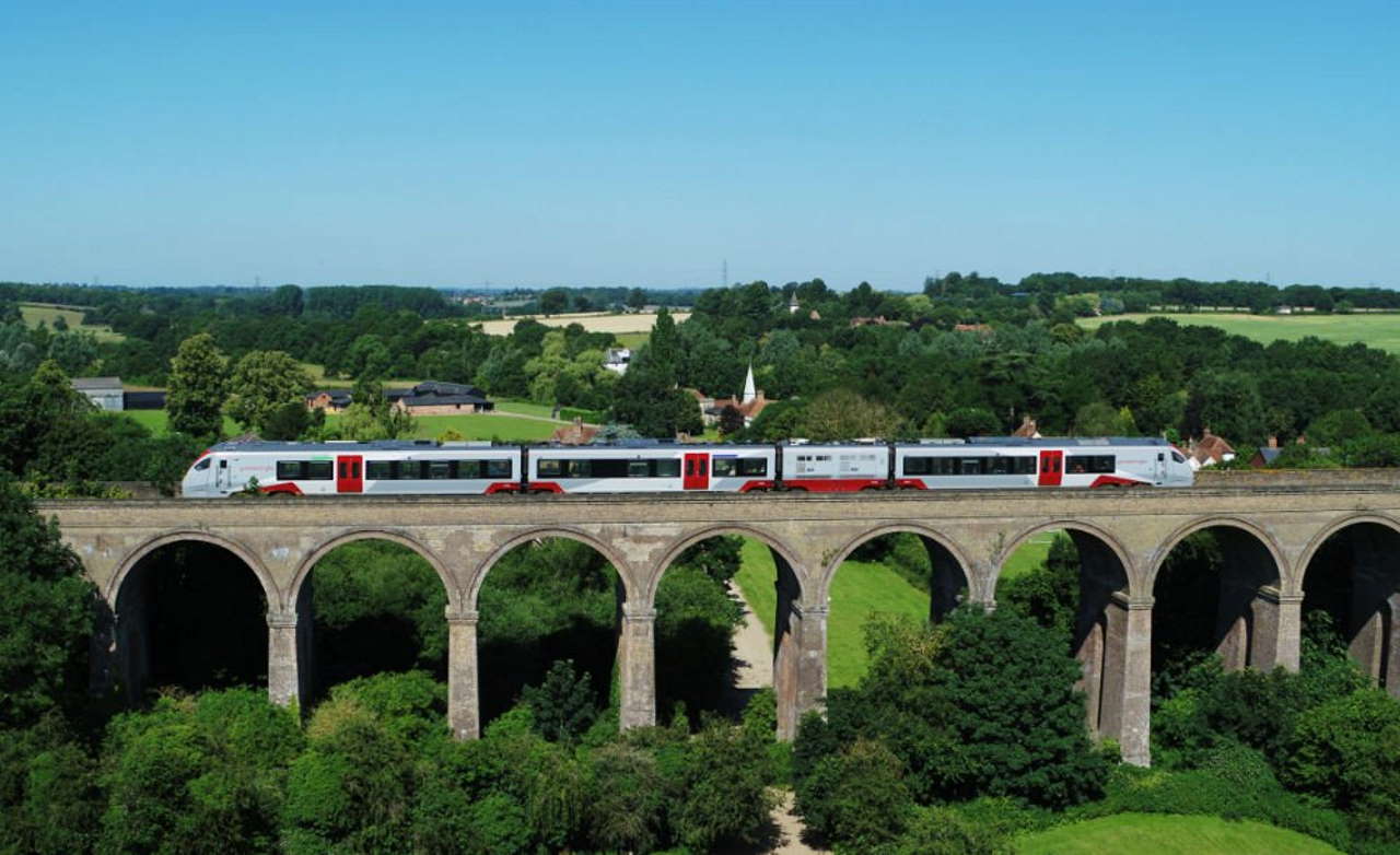 A Greater Anglia train crosses Chappel viaduct