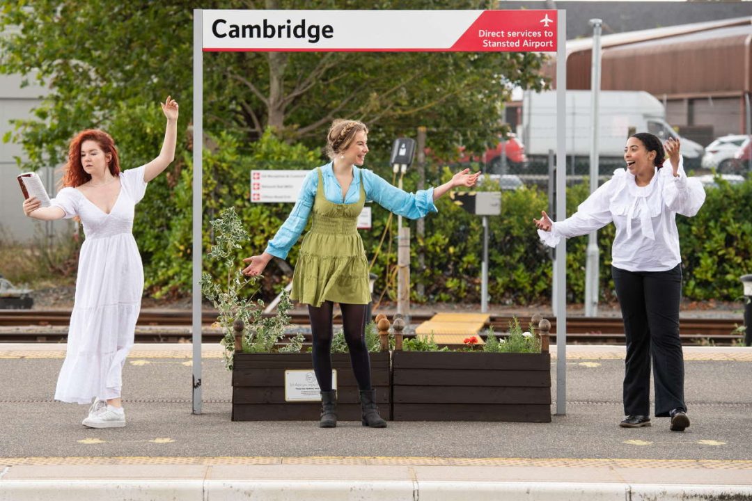 Actors celebrate the new partnership at Cambridge station