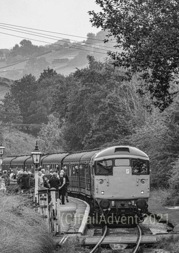 BR Class 26 26007 arrives at Oakworth, Keighley and Worth Valley Railway