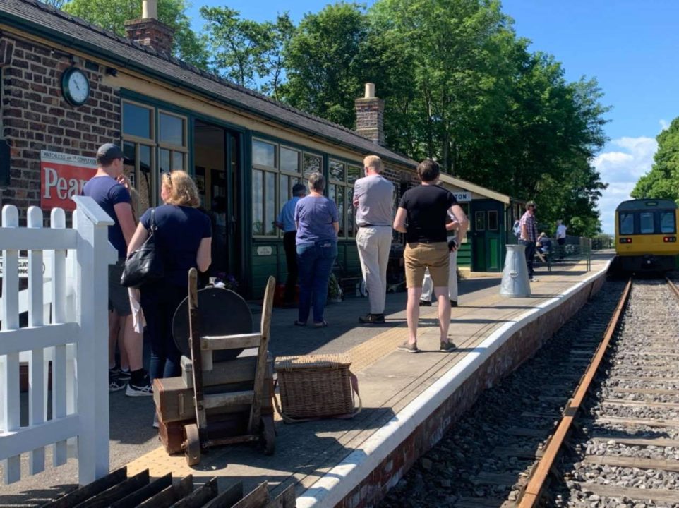 people on a WensleyDale railway line