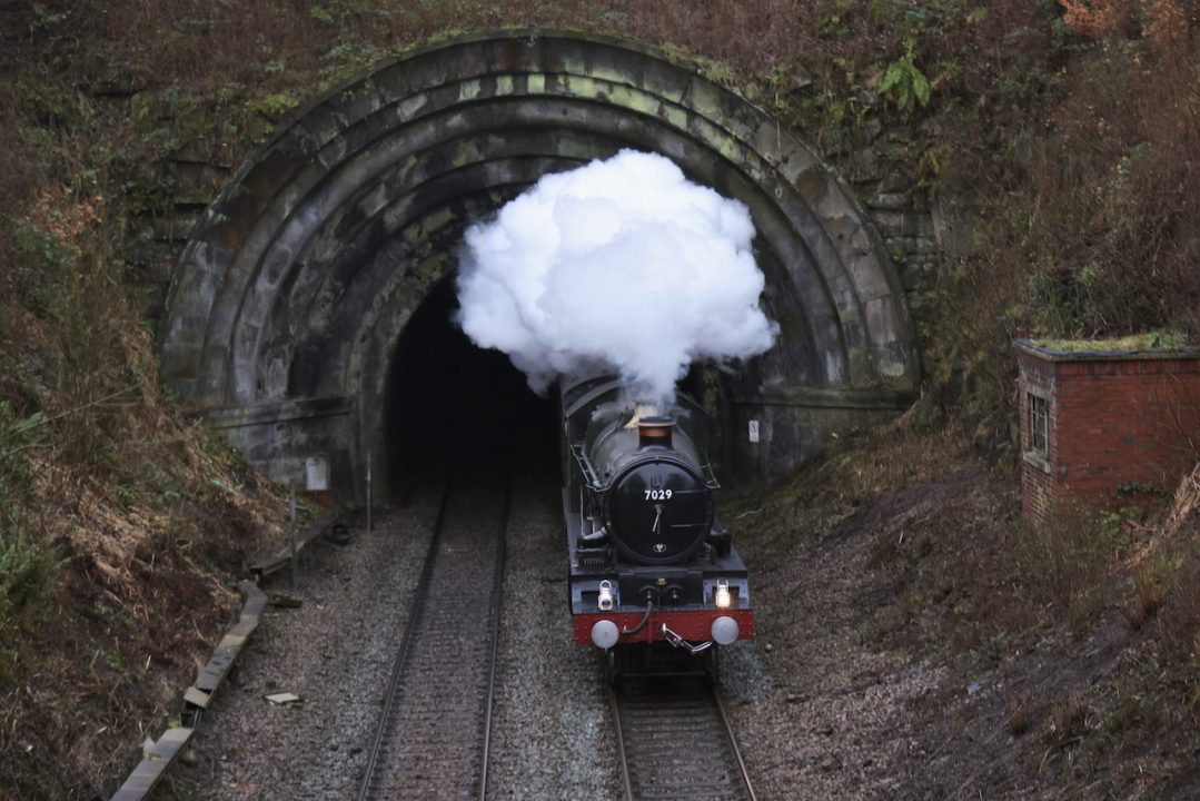 7029 Clun Castle looks magnificent leaving Milford tunnel