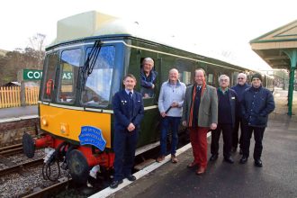 Last Corfe Castle signalman welcomes Swanage Railway commemoration train