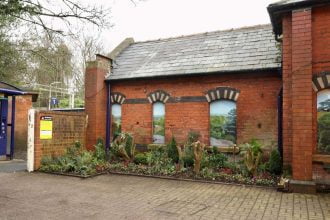 Music Legend unveils artwork celebrating village’s heritage at Cheshire station