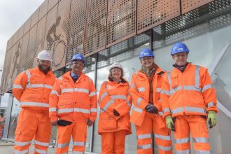 Frieze depicting athletes added as Perry Barr station nears completion