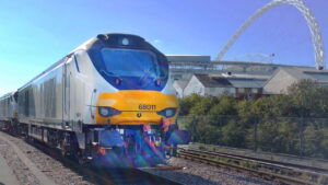 Chiltern train passing Wembley stadium stockshot