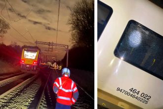 Vandals throw log at oncoming train near Bolton causing damage to the train and infrastructure