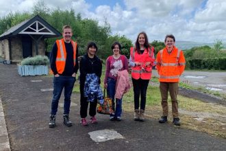 Rail volunteers team up to give Devon railway station a spring clean