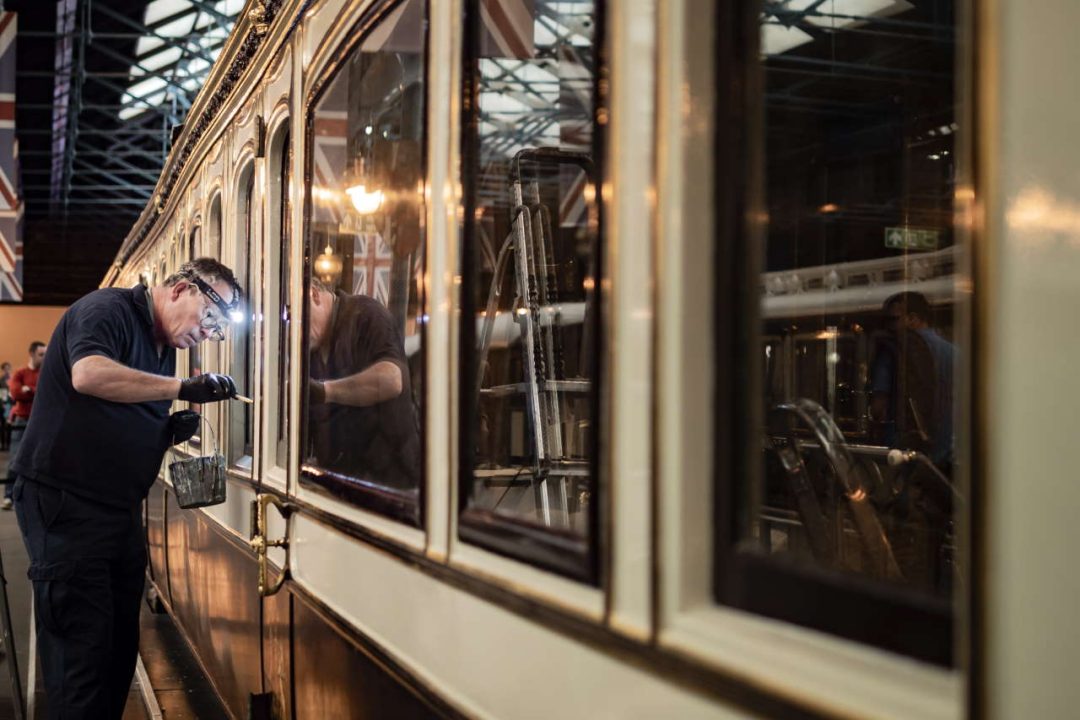 Chris Binks works on Queen Victoria's Saloon