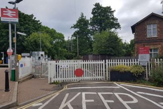 Near-miss with train at Farnborough North footpath level crossing