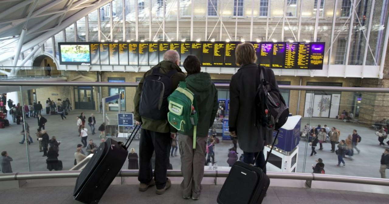 passengers looking at the departure