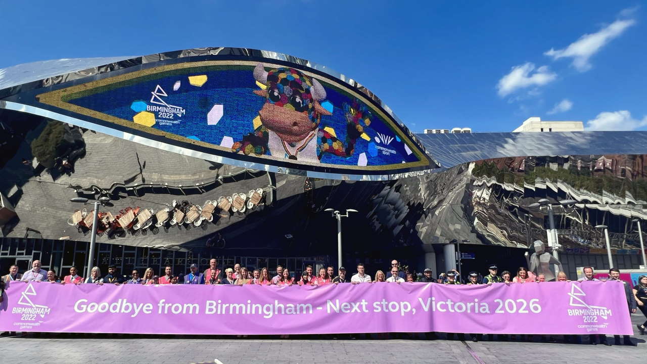 Huge handover banner outside Birmingham New Street station at the end of the Commonwealth Games