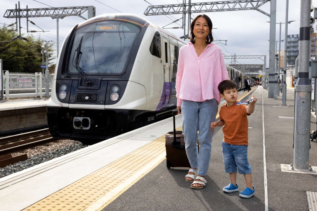 A lady and her son with the train