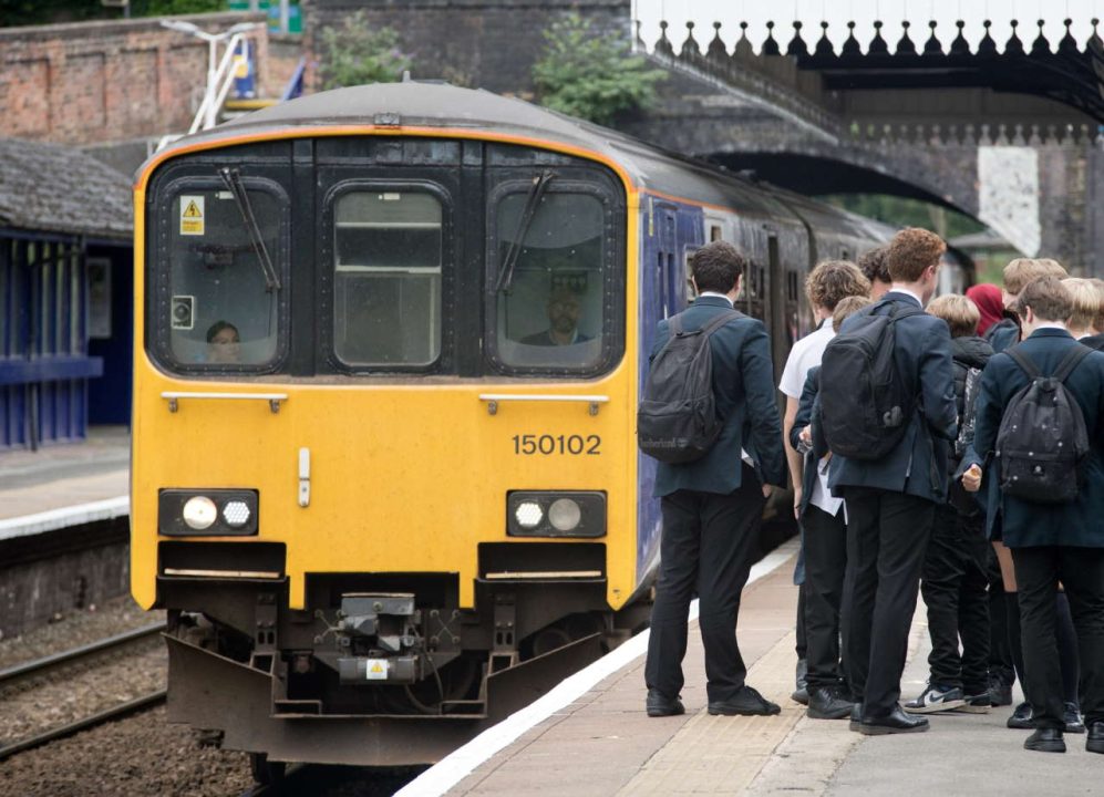 School students boarding a Northern service