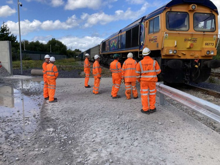 team watches first freight train at Breedon Llandudno Jct Jul22