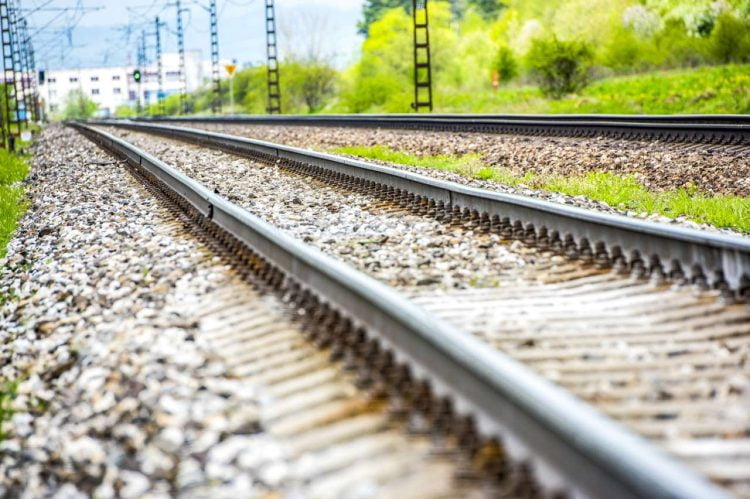 Railroad track rails in coutry landspace