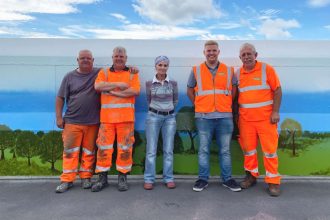 Village campaign sees Lancashire railway bridge get a rural mural