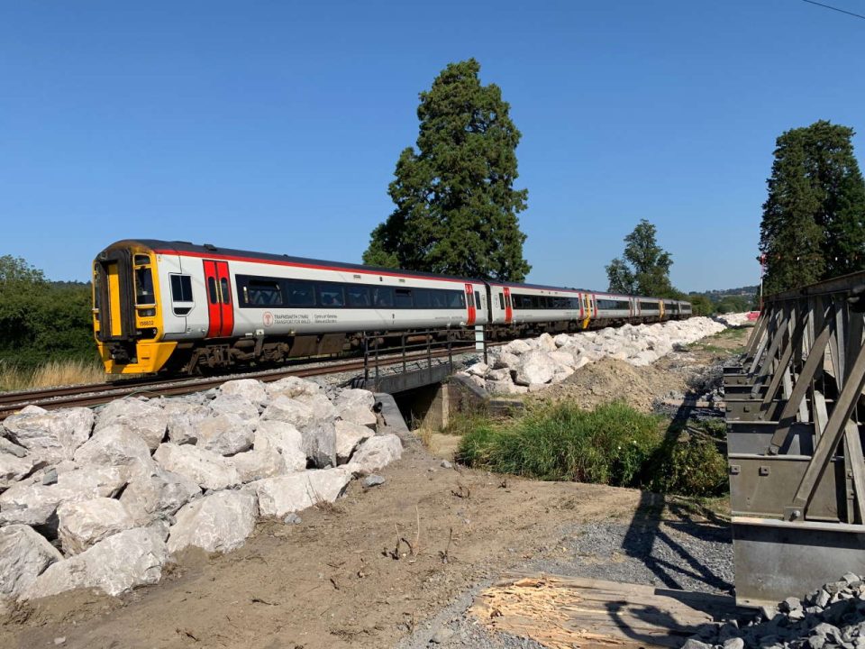 Transport for Wales Class 158s pass the Rock Armour