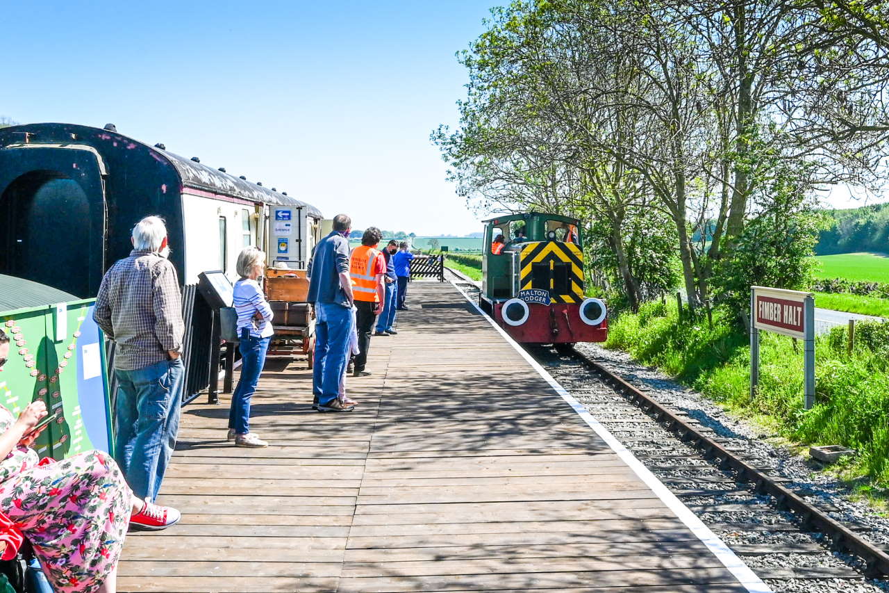 passengers waiting to board the locomotive for a cab ride at Fimber Halt