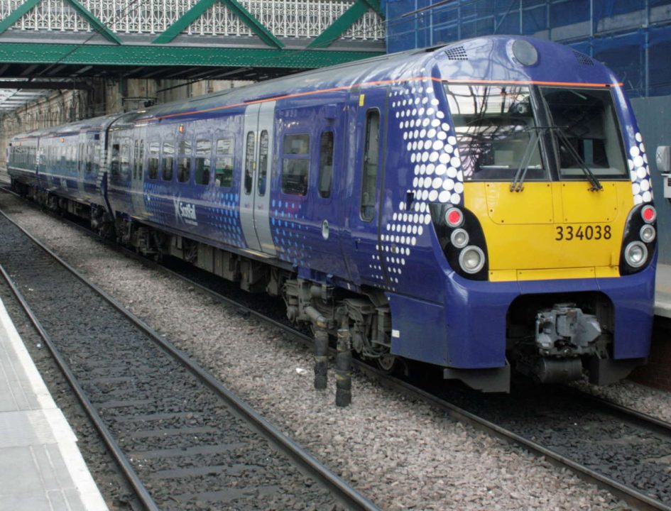 334038 stands at Edinburgh Waverley