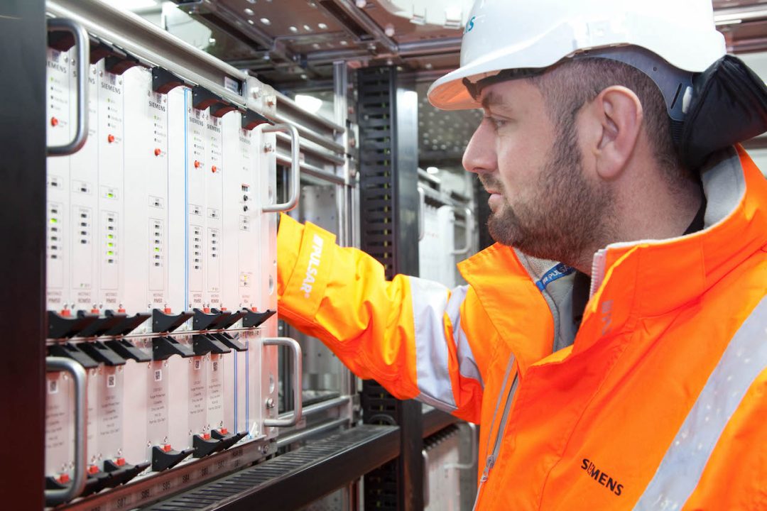 Engineer testing new signalling equipment