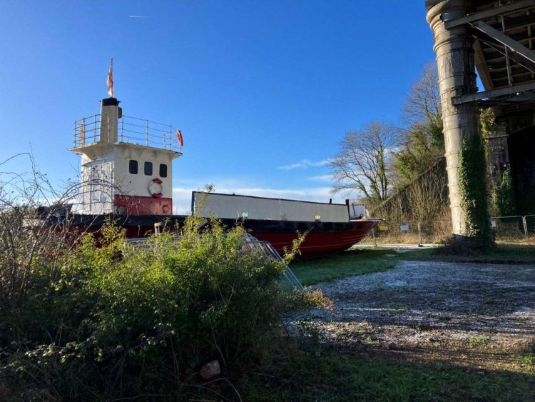 Boat underneath Chepstow viaduct_J