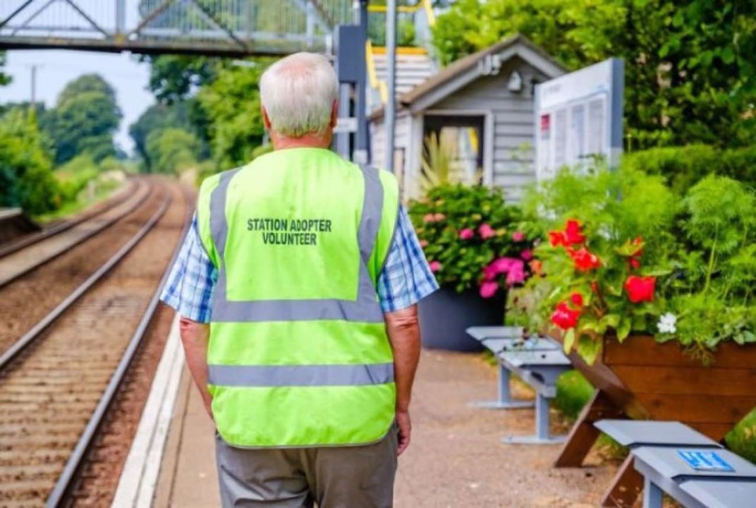 A station adopter surveys his gardens