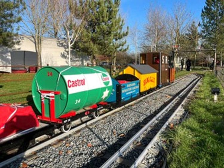 Castrol tanker, engineering wagon, Saxa Salt wagon, and SR guards wagon, in formation at Burtonshaw staiton