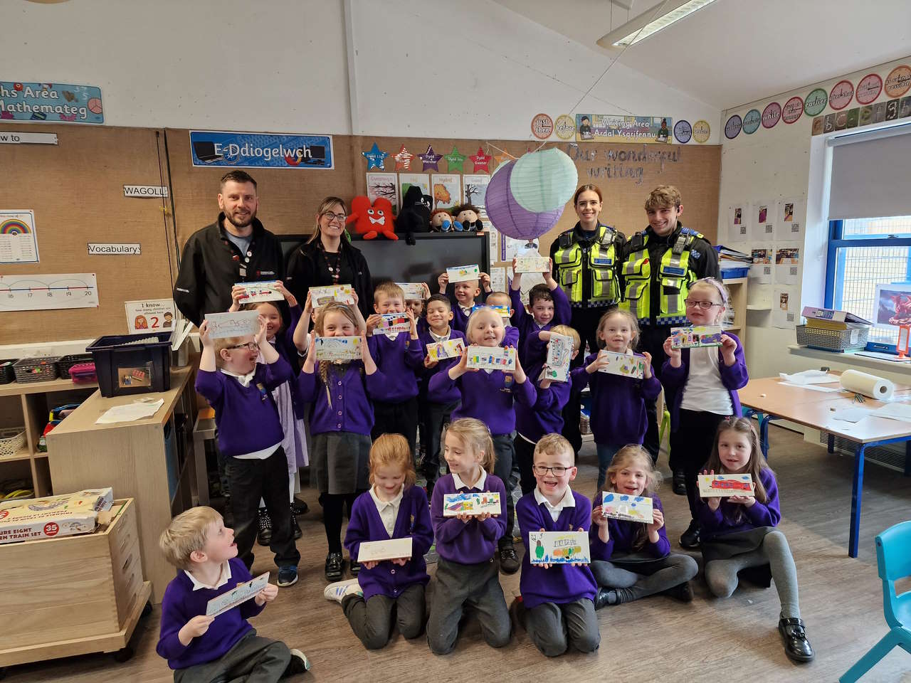 Children with artwork for Colwyn Bay Railway Station