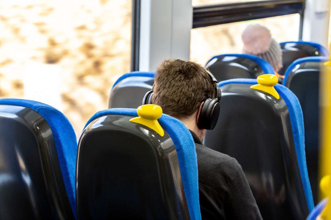 Image shows customer on-board a Northern train