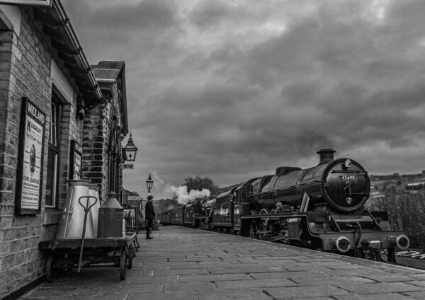 45690 Leander and 45407 The Lancashire Fusilier arrive into Oakworth, Keighley and Worth Valley Railway