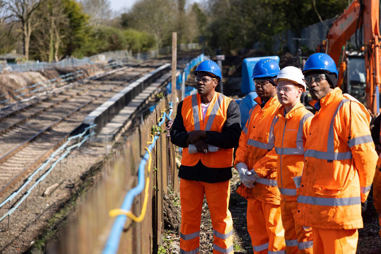 The delegation from Utech Jamaica at Pineapple Road Station construction site