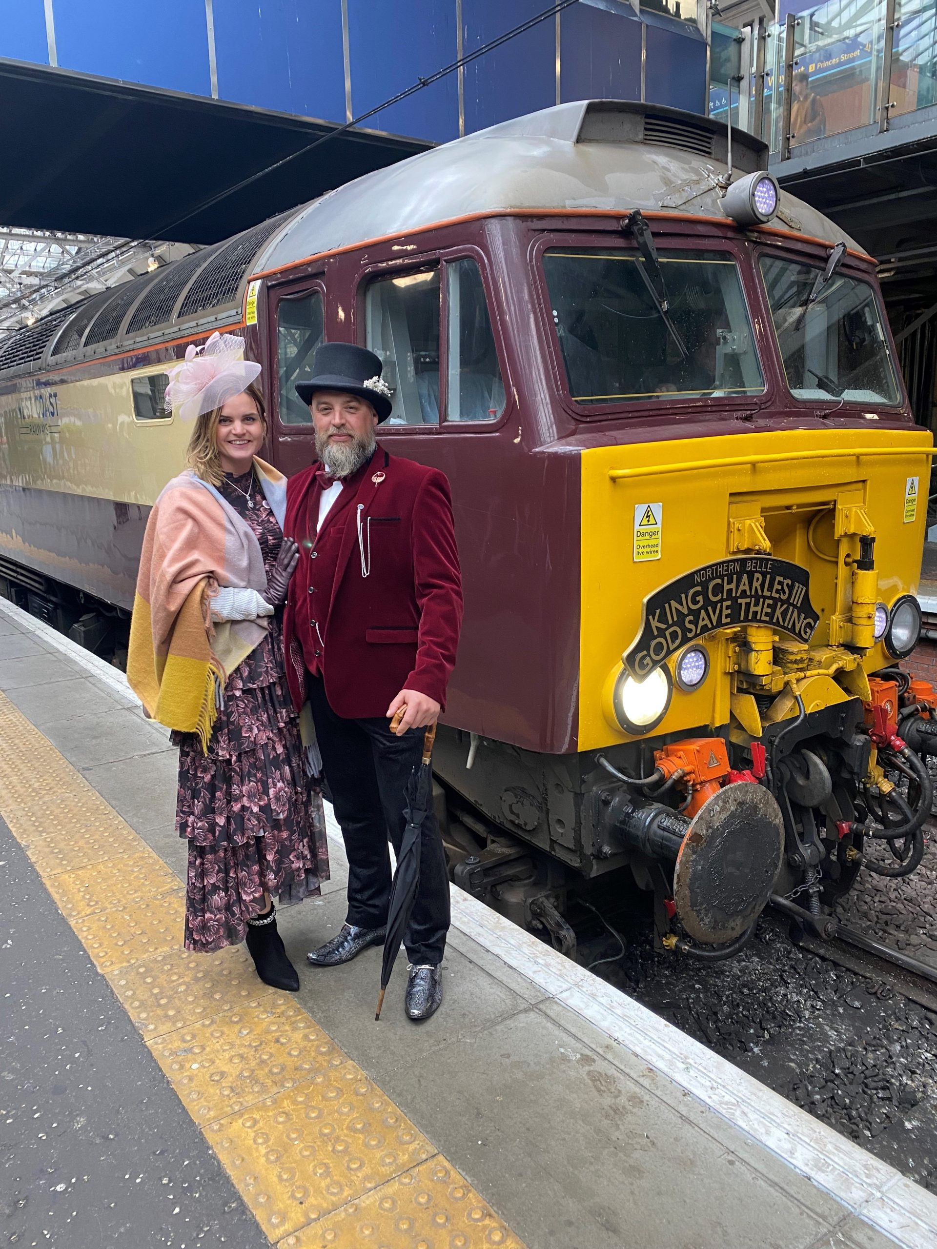 Class 57 with the Coronation Headboard