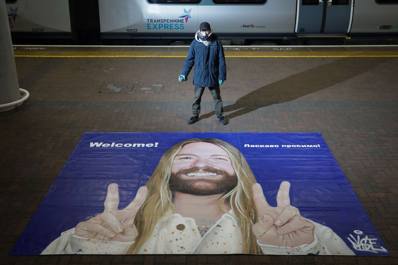 Eurovision sensation, Sam Ryder, has been immortalised on a mural at Manchester Airport Station - street artist Aske was commisioned