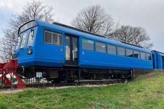 Hitachi Rail engineers help convert disused carriage into library