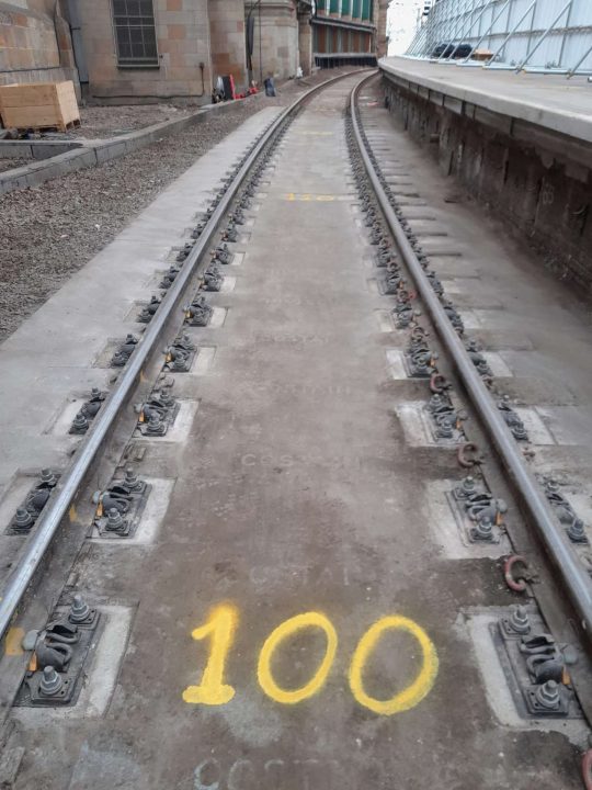 Installing over 100 new timber sleepers along the length of platform 1