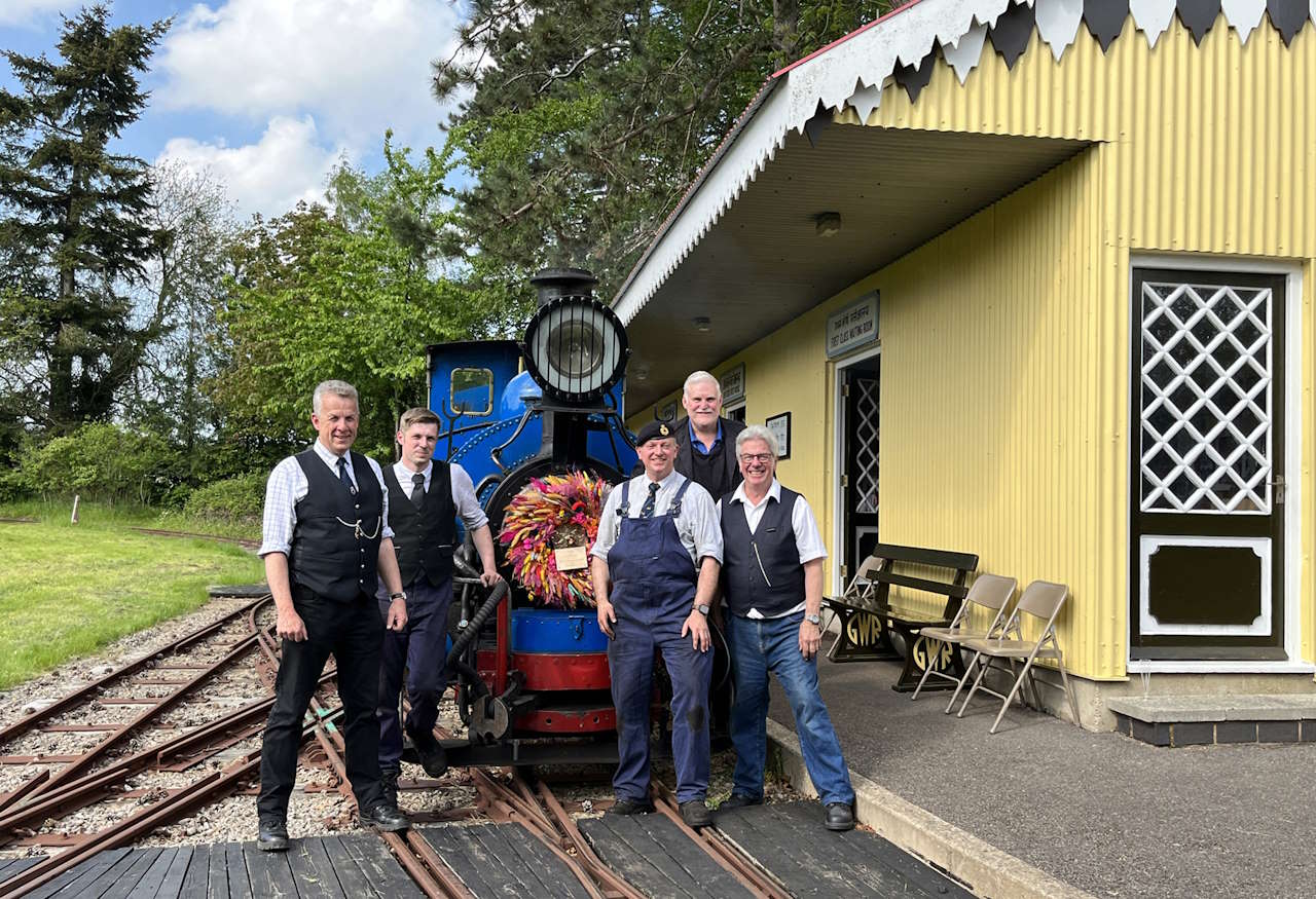 The support crew pose at the BLR Rinkingpong Road station 19b carrying Adrians support crew wreath steaming for auctioneers Jeremy Davey