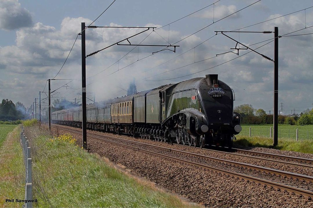 60019 "Bittern" passes Flyfish Crossing working 1Z27 Kings Cross - Edinburgh. "The Coronation" charter.